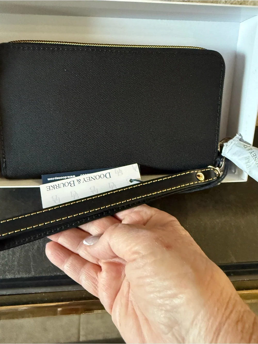 Dooney & Bourke Black Zip-Around Continental Wallet with Logo Patch